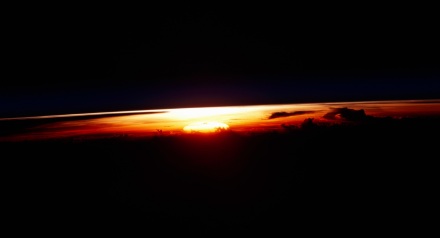 Sunrise view taken by the STS-109 crew aboard the Space Shuttle Columbia. NASA Identifier: sts109-345-032